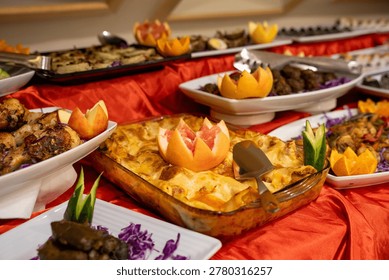 Buffet table presenting a wide array of food dishes for guests