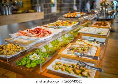 Buffet of a wedding with fish and meat appetizers