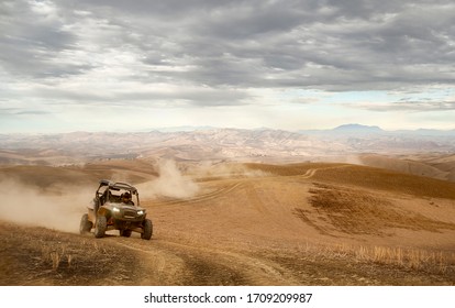 A Buggy Crossing The Desert In Morocco