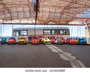 Bugibba, Malta, 17 Sep 2022: Empty Bumper Car Autodrom, Bumper Cars Lined Up In The Distance 