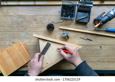 Build Birdhouse, Wood, Screws And Tools Lying On The Bench