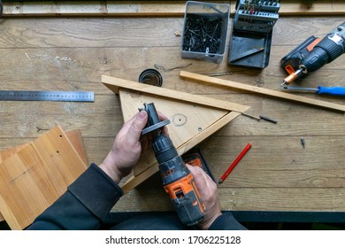 Build Birdhouse, Wood, Screws And Tools Lying On The Bench