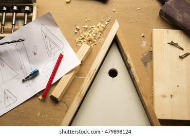 Build Birdhouse, Wood, Screws And Tools Lying On The Bench