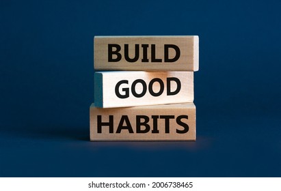 Build good habits symbol. Wooden blocks with words 'build good habits'. Beautiful grey background, copy space. Business, psychological and build good habits concept. - Shutterstock ID 2006738465