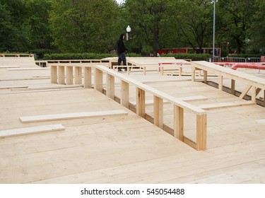 Build New Skatepark.Assembly,installation Process Outdoors.Building Skate Park Outside.Grind Rail, Grindbox And Wooden Jump Radius.Wood Constructions For Skating On Skate Board,rollerblades And Bmx