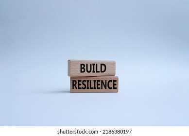 Build Resilience Symbol. Wooden Blocks With Words Build Resilience. Beautiful White Background. Business And Build Resilience Concept. Copy Space.