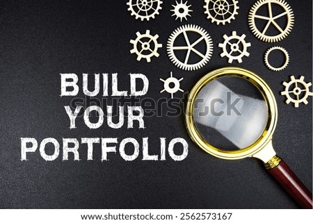 Build Your Portfolio text message with magnifying glass on black background