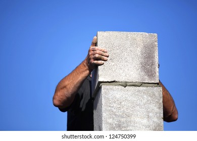 Builder creating a chimney stack