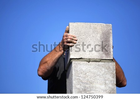 Builder creating a chimney stack