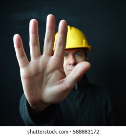 Builder In Hardhat Hand Up Stop