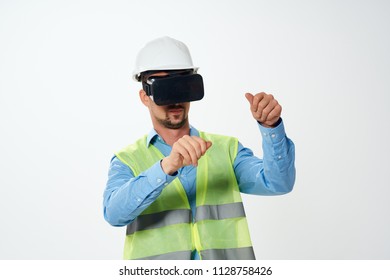  Builder In A Helmet In 3d Glasses In A Virtual Reality Construction                              