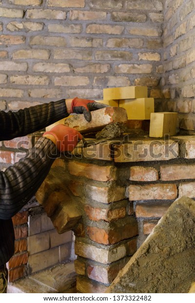 Builder Lays Down Bricks Fireplace Fastens Stock Photo Edit Now