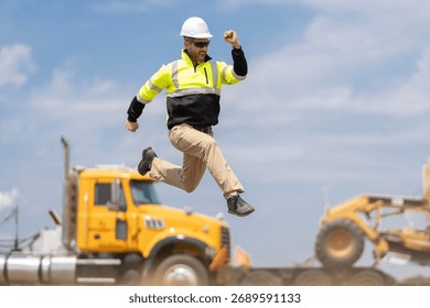 Builder man run fast to work. Engineer supervisor running outdoor. Supervisor jumping. Excited construction builder. Worker jumping at heavy machines. Man engineer running to success. Labor day