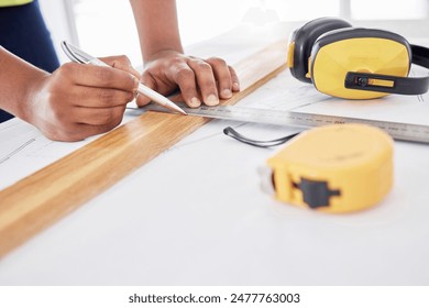 Builder, planning and blueprint of person hands with tools, measurement and architecture floor plan. Working, ruler and construction job at company with drawing of home renovation with employee - Powered by Shutterstock