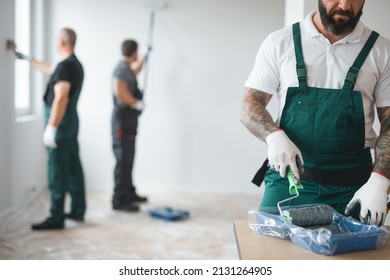 Builder preparing to paint the apartment during renovation - Shutterstock ID 2131264905