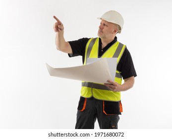 Builder Showing Thumb Up. Employee Of A Construction Firm Hands Out Order. Concept - Builder Points Out Problem. Civil Engineer On A White Background. Construction Team Leader Commands.