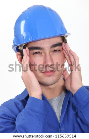 Builder suffering from headache