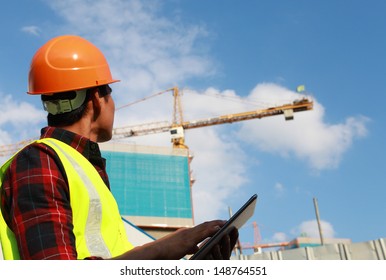 Builder worker activity with digital tablet on construction site