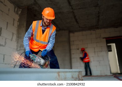 Builder Worker With Grinder Machine Cutting Metal