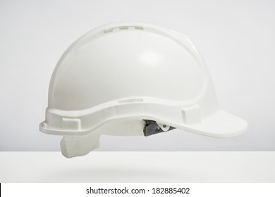Builders hard hat isolated on white background. DIY protection and safety concept