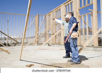 Builders On Construction Site