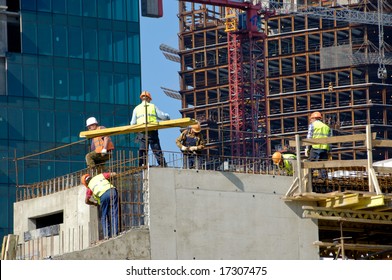 Builders Work On Skyscraper Construction