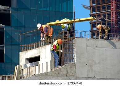 Builders Work On Skyscraper Construction