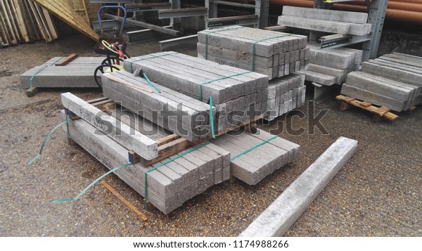 Builders Yard palettes\
of  concrete beams