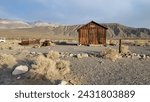 Building in the abandoned town of Ballarat in the desert with mountains in background