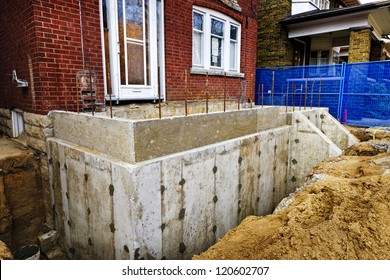 Building Addition To Residential House With New Foundation