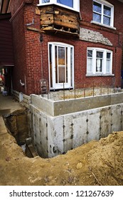 Building Addition To Residential House With New Foundation