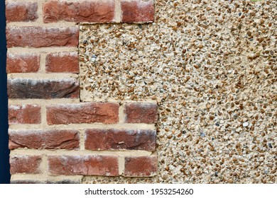 Building background with combination of bricks and pebble dashing with copyspace - Shutterstock ID 1953254260