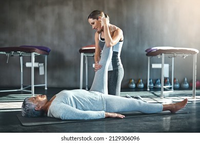 Building Balance And Strength For A Better Quality Of Life. Shot Of A Senior Woman Working Out With Her Physiotherapist.