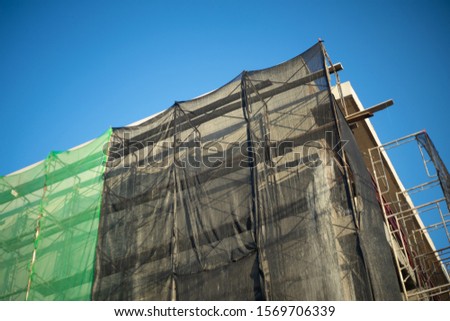 Similar – Image, Stock Photo Building protection net, shade and sunshine