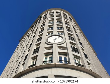 Building with big clock in the facade