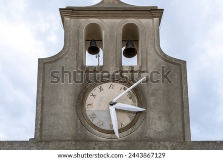 Building with big tower clock inside Sant Elmo castle, Naples, Italy.