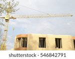 Building of the brick house with the elevating crane, Moscow Region, Russia