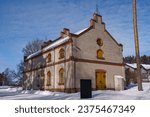 Building with cafe in historical Verla mill museum and village in winter. UNESCO World Heritage Site in Kouvola, Finland. March 6, 2023.