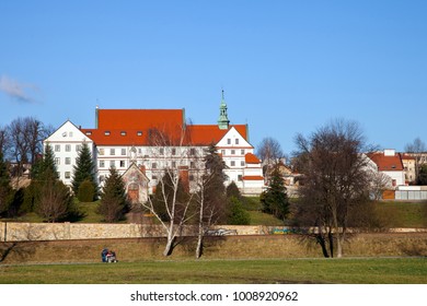 Building And Church Of Woman Monastery Of Friars Minor Order In Wieliczka Sunny Winter Day, Poland