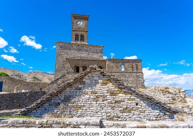 Building and clock tower built on top of Gjirokaster castle in Gjirokastner- Albania.04-04-2024