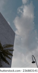 Building with cloudy clouds view 