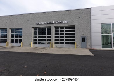 Building With A Commercial Vehicle Repair Shop With Four Garage Doors