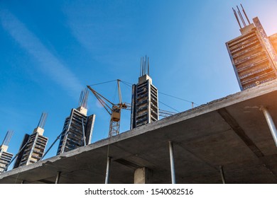 Building construction on monolithic technology. Concrete frame of the building.Formwork for pouring the concrete base of the building.Multi-storey construction. - Shutterstock ID 1540082516
