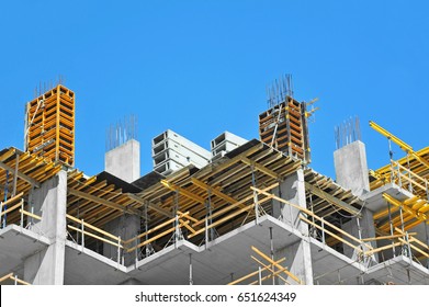 Building Construction Site Work Against Blue Sky