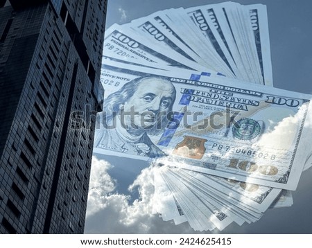 Building in downtown at blue sky with 100 usd banknotes background