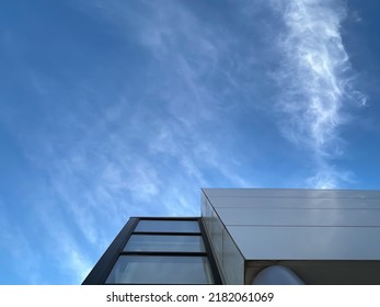 Building Edge with Blue Cloudy Sky