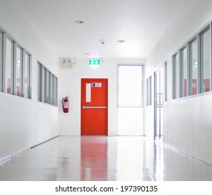 Building Emergency Exit with Exit Sign and Fire Extinguisher