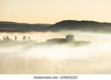 Building Emerging From The Fog.