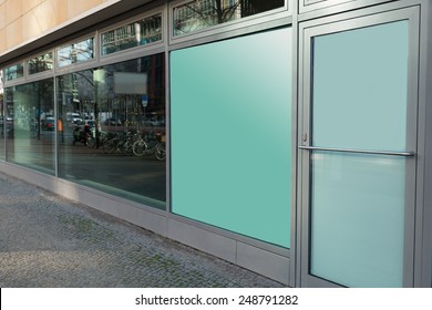 Building Exterior With Glass Window And Closed Door