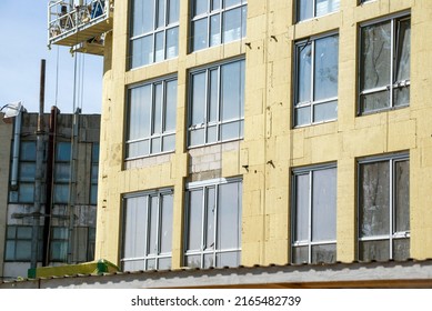 Building External Wall Thermal Insulation With Mineral Wool. Exterior Passive House Wall Heat Insulation With Mineral Wool. Insulation The Facade Of Commercial Building. Energy Efficiency